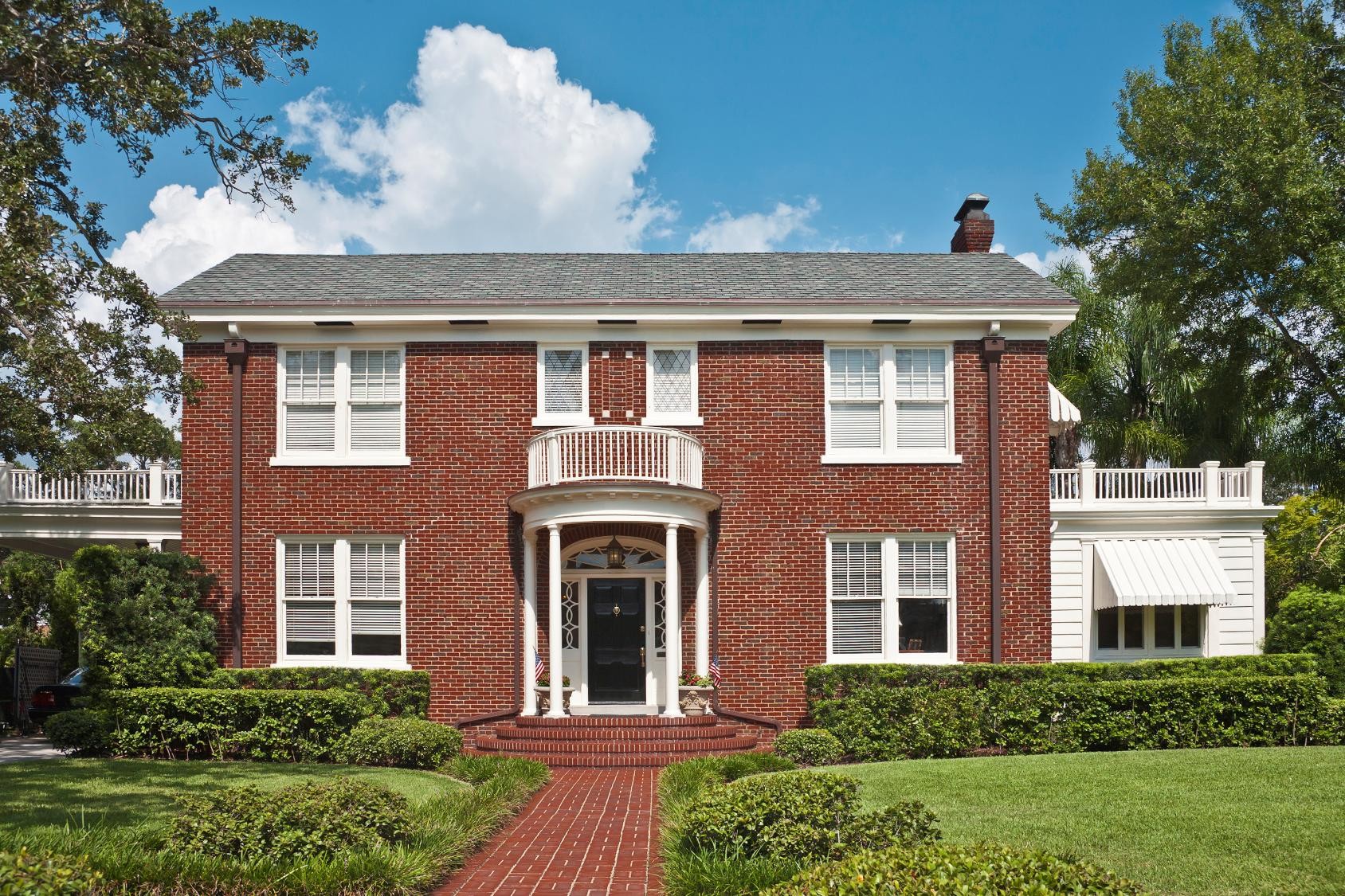 Stock image - Three Story Brink Colonial.